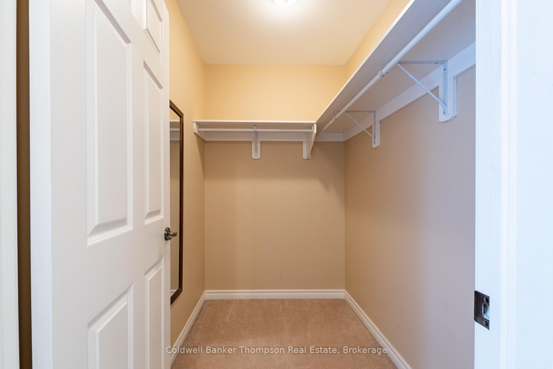 Primary Bedroom Walk-In Closet