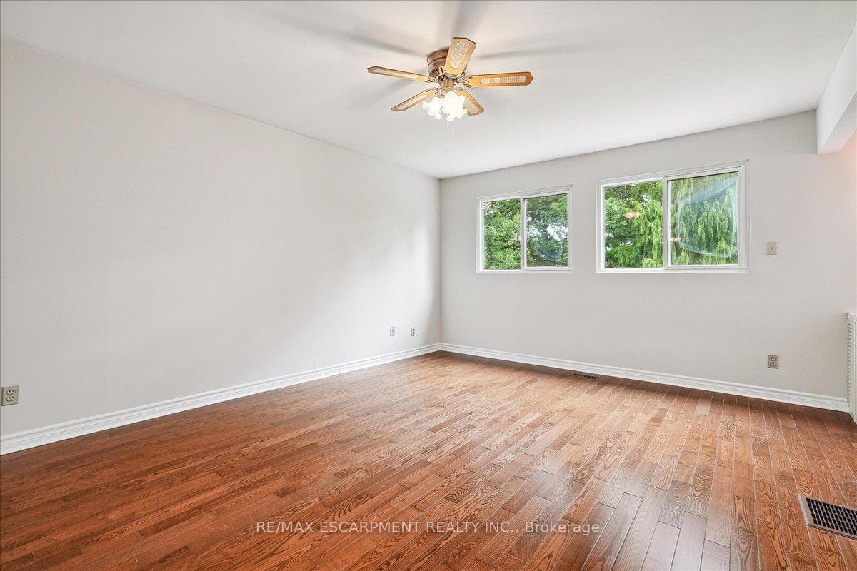 Primary bedroom overlooks the backyard