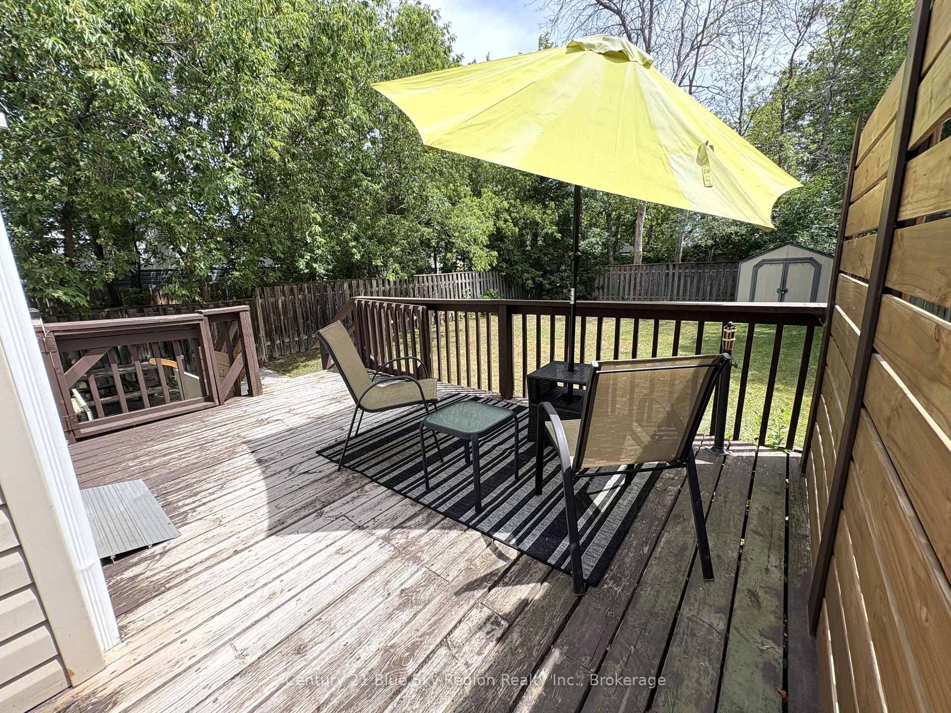 Rear deck overlooking fully fenced back yard