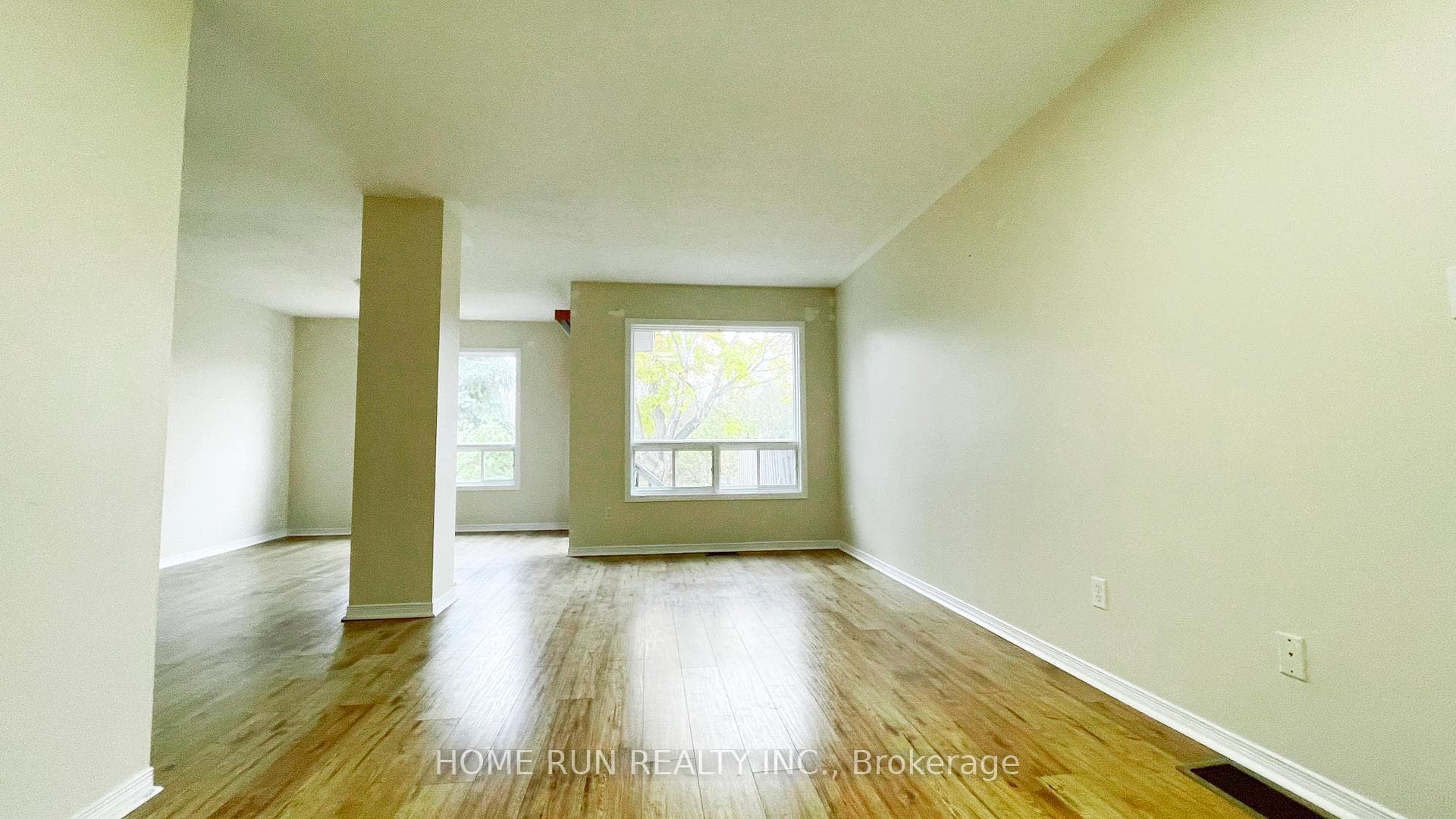 Living room-hardwood floors, two bright windows