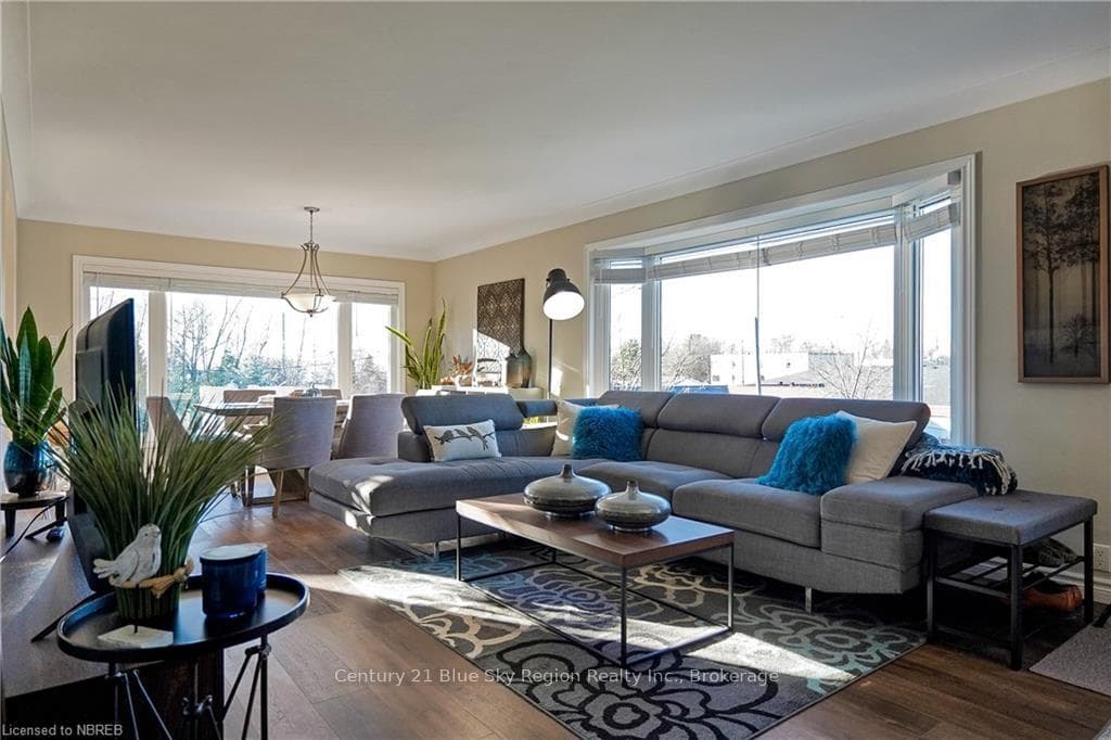 Living room featuring dark hardwood / wood-style f