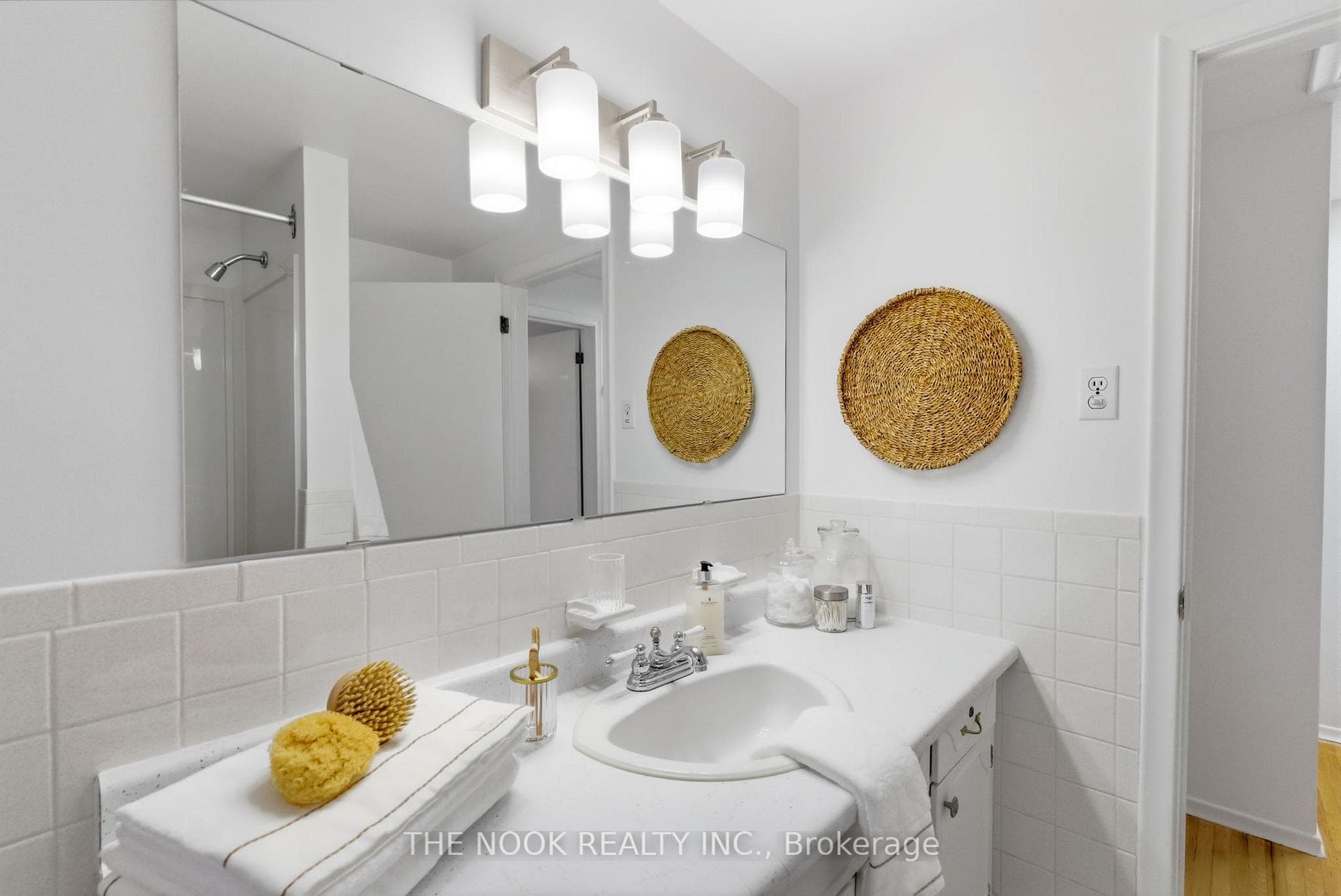 The large wall mounted mirror is so functional