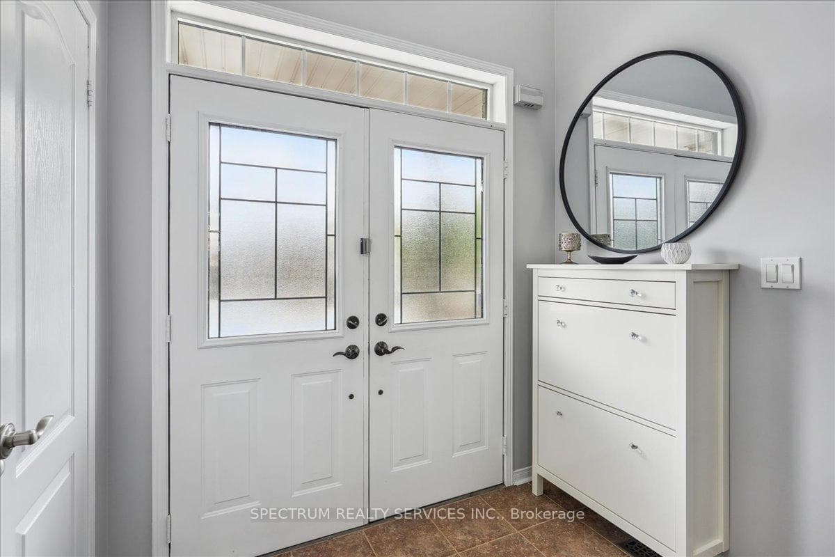 Double door entrance with transom window