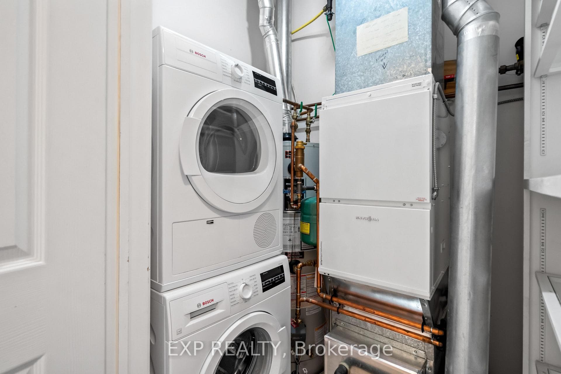Stacked Bosch Washer/Dryer & Utility Room