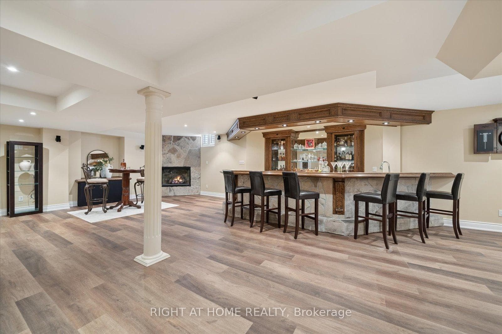 Custom bar in lower level w/fireplace