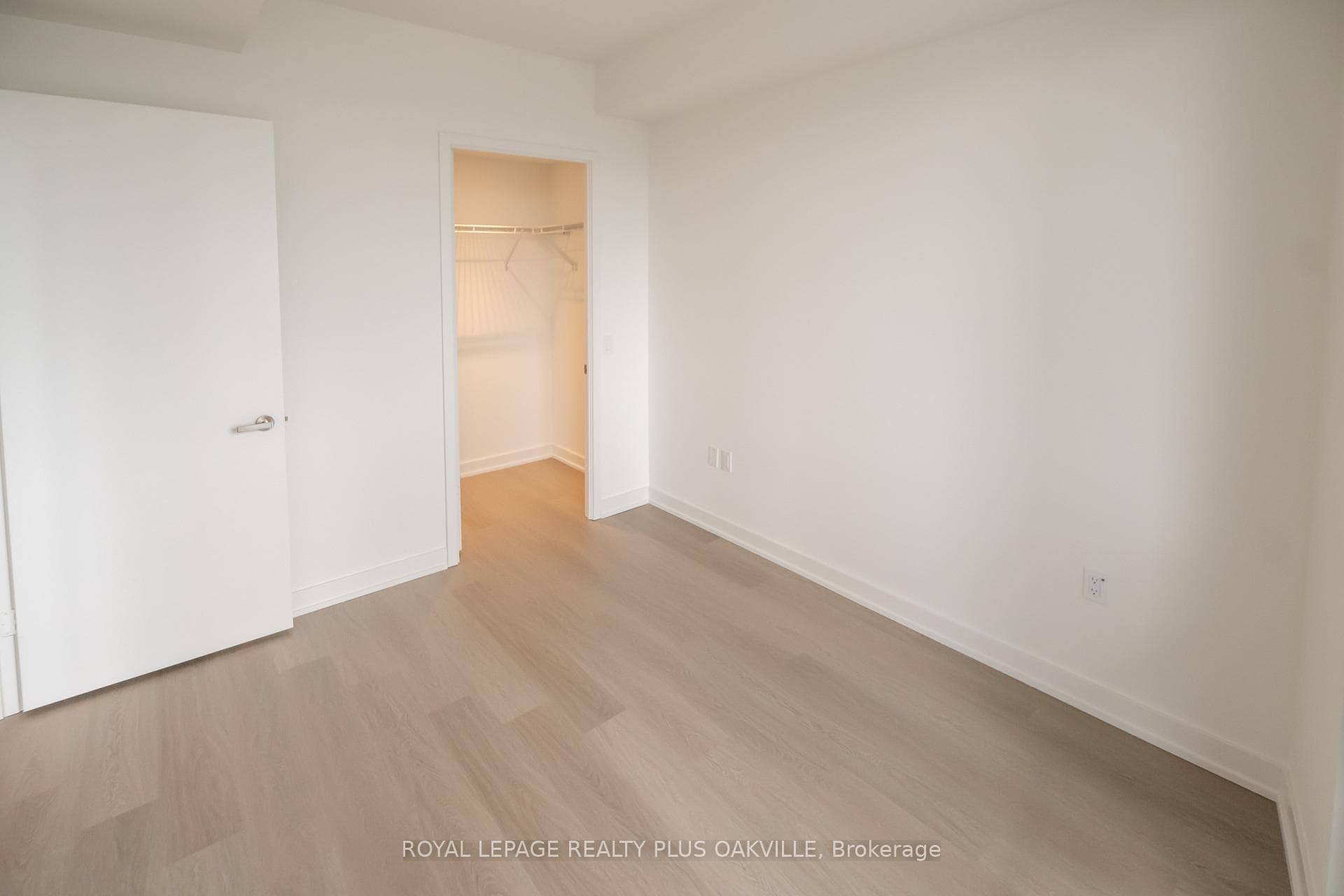 primary bedroom with walk in closet