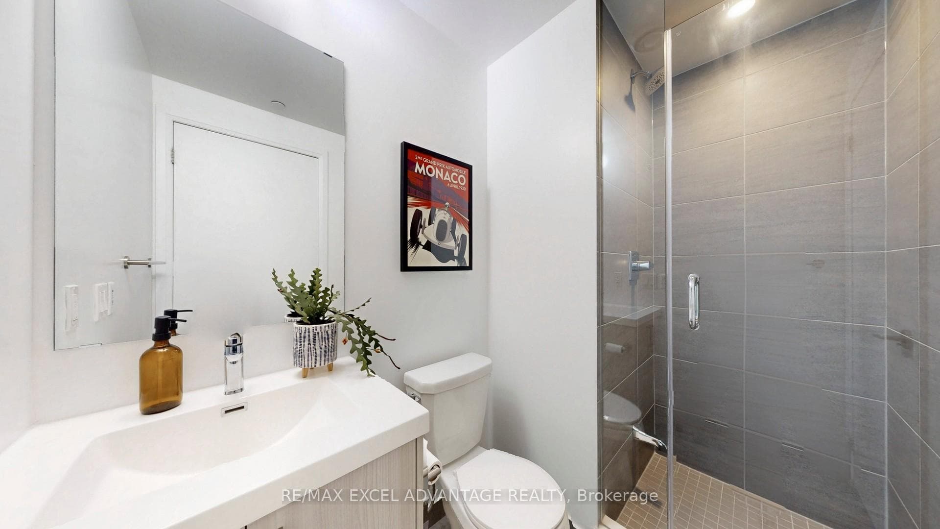 Stylish bathroom featuring a glass shower