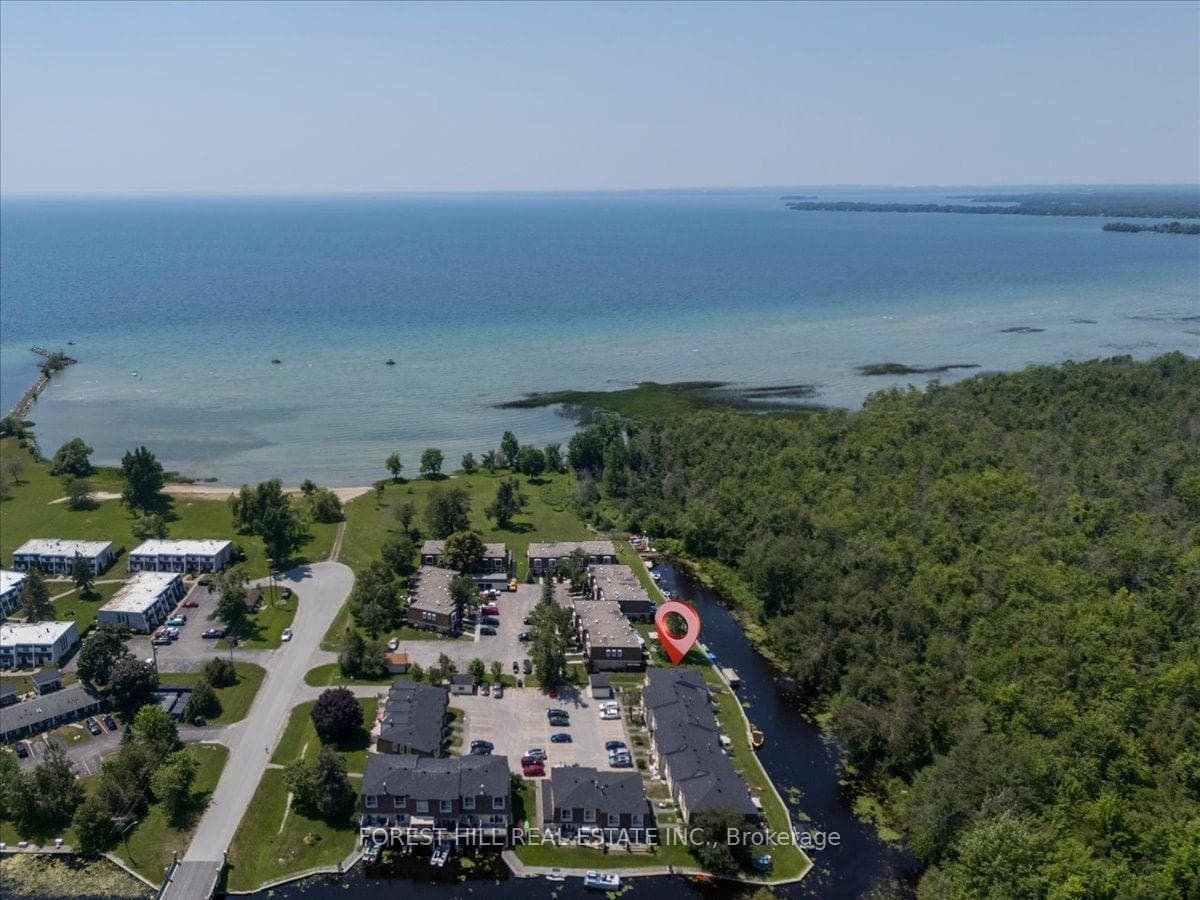 Steps to a resident only beach on Lake Simcoe.