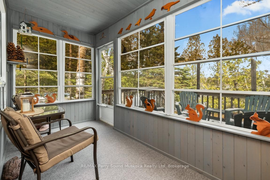 Enjoy nature from the screened 3 season sunroom