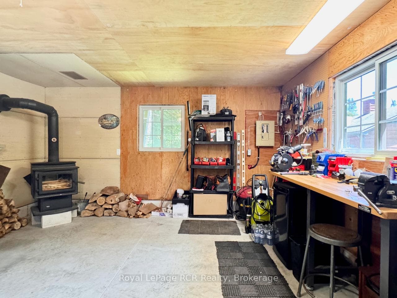 Garage is fully finished including wood stove.