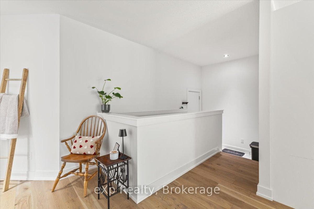 Entrance to Attached Garage and Basement Staircase