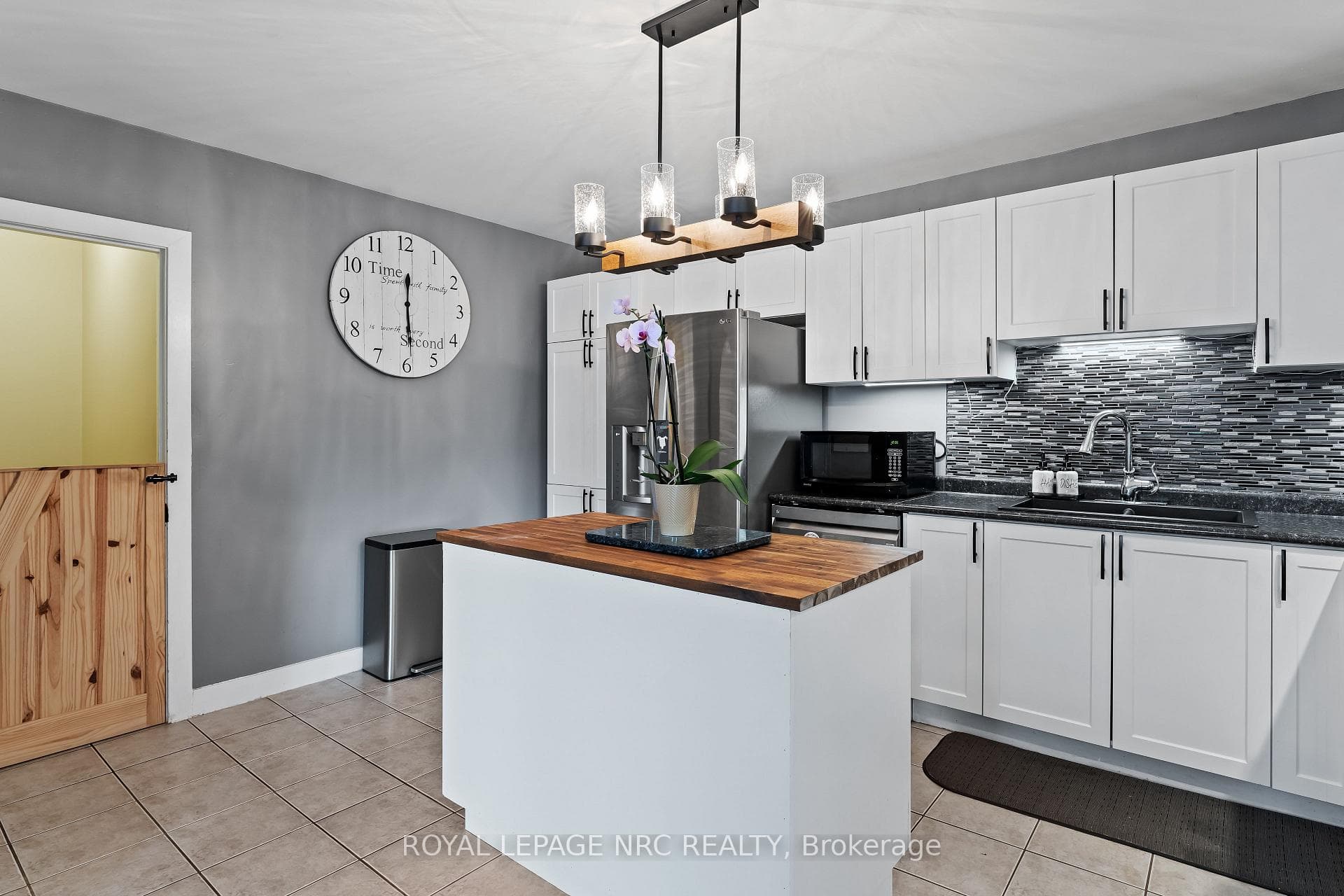 View of Kitchen leading to basement