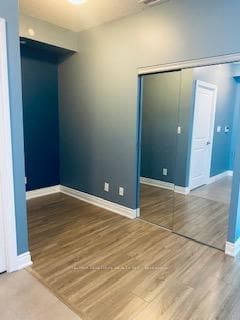 Functional Den with Mirrored Closet