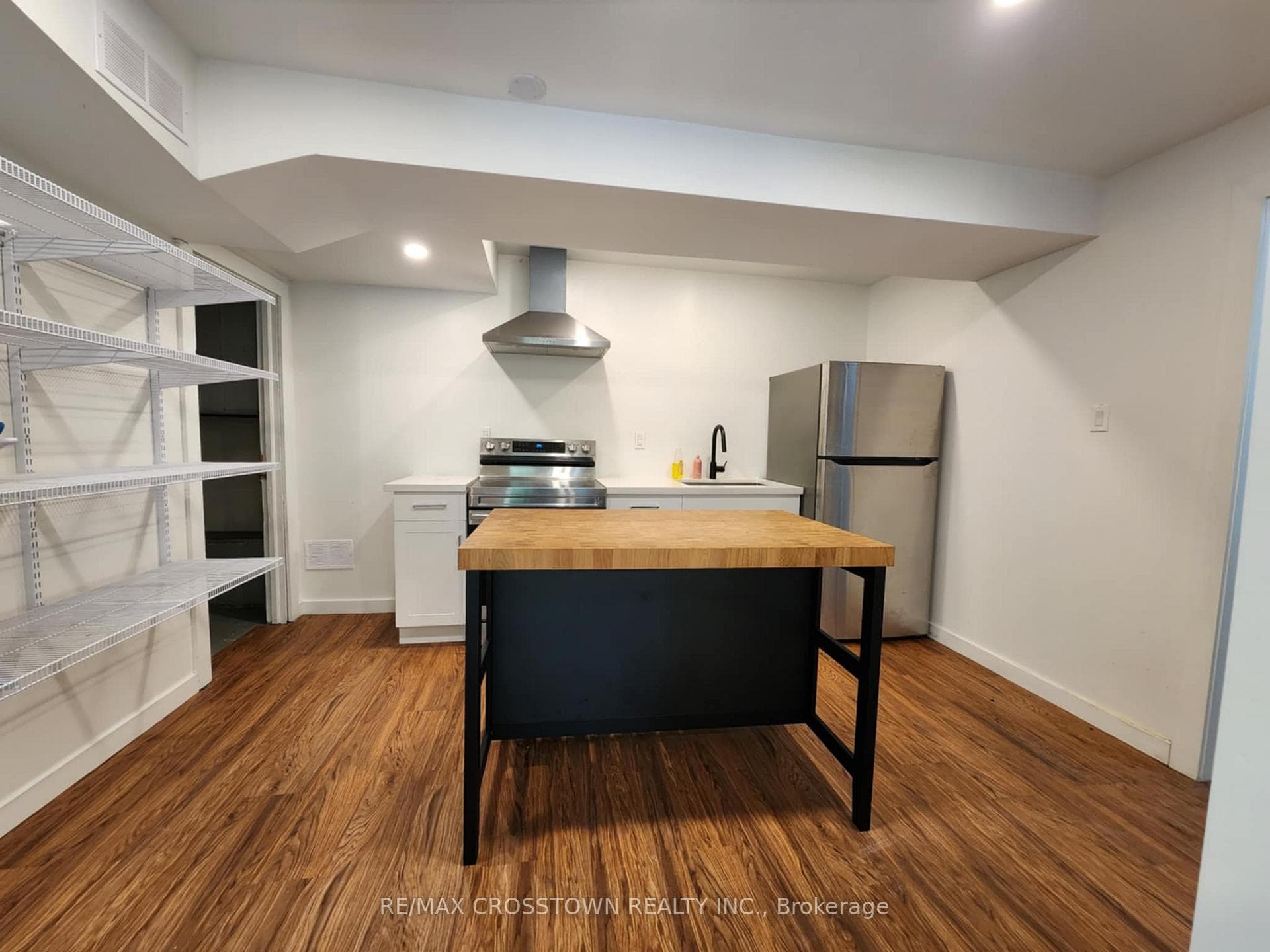 Kitchen with laundry room off of in the back left