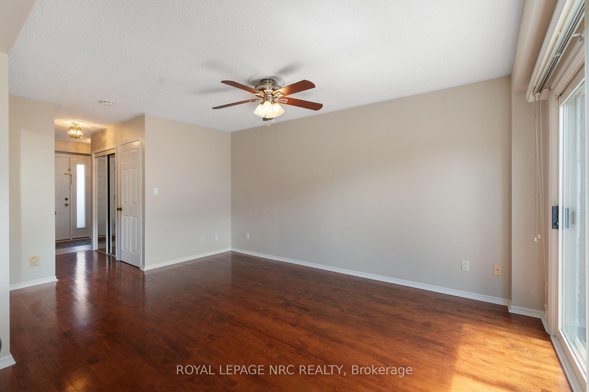 Living room view toward front entrance
