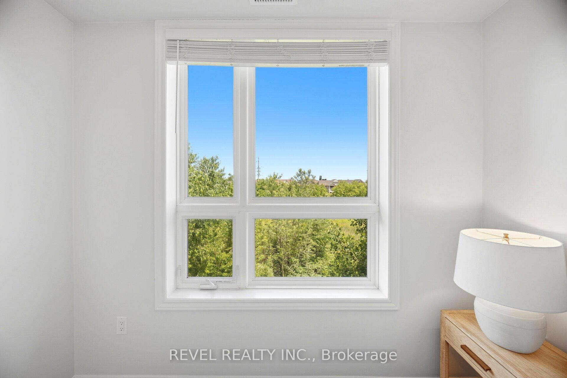Primary Bedroom - overlooking green space