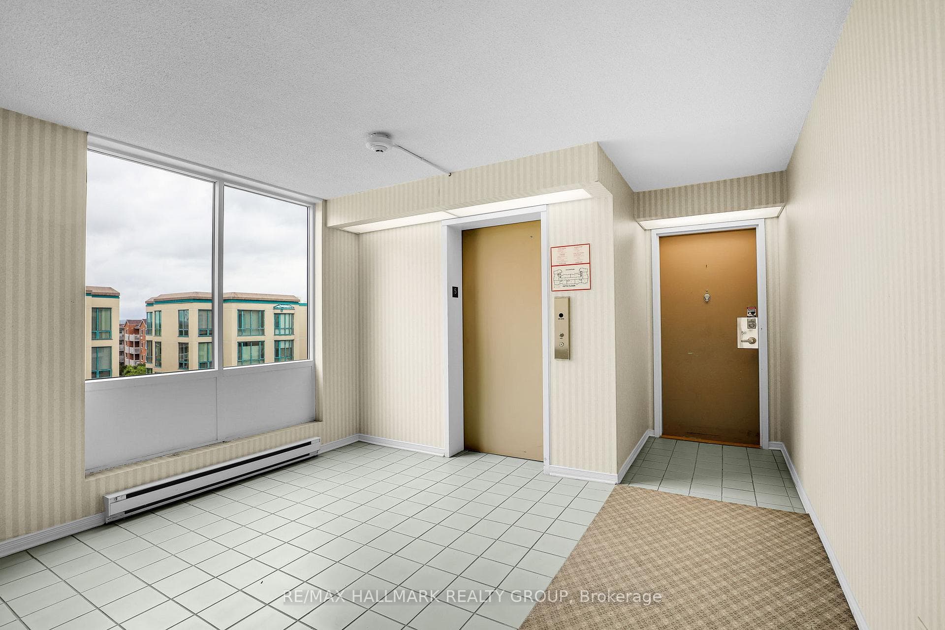 Entrance right next to parking elevator!