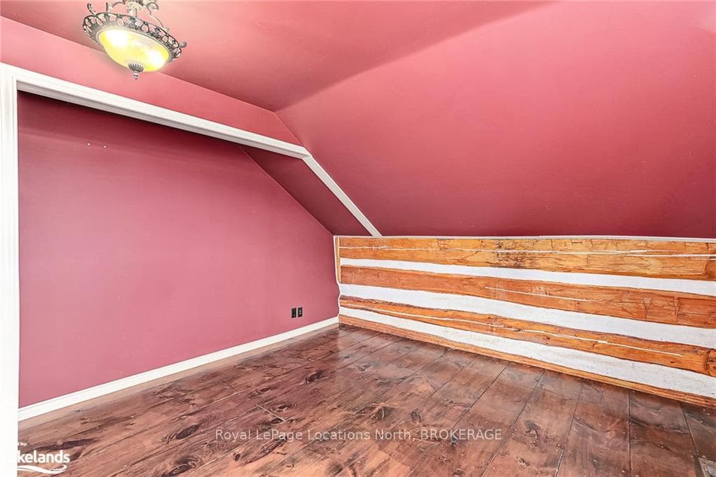 Additional living space with hardwood / wood-style