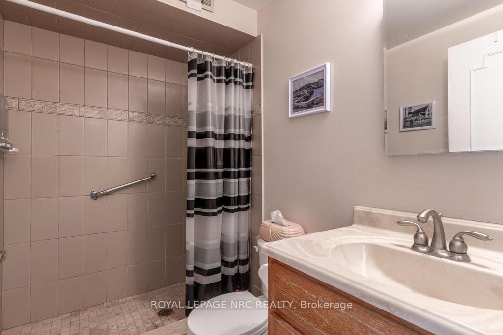 3PC bathroom w walk-in shower located off primary