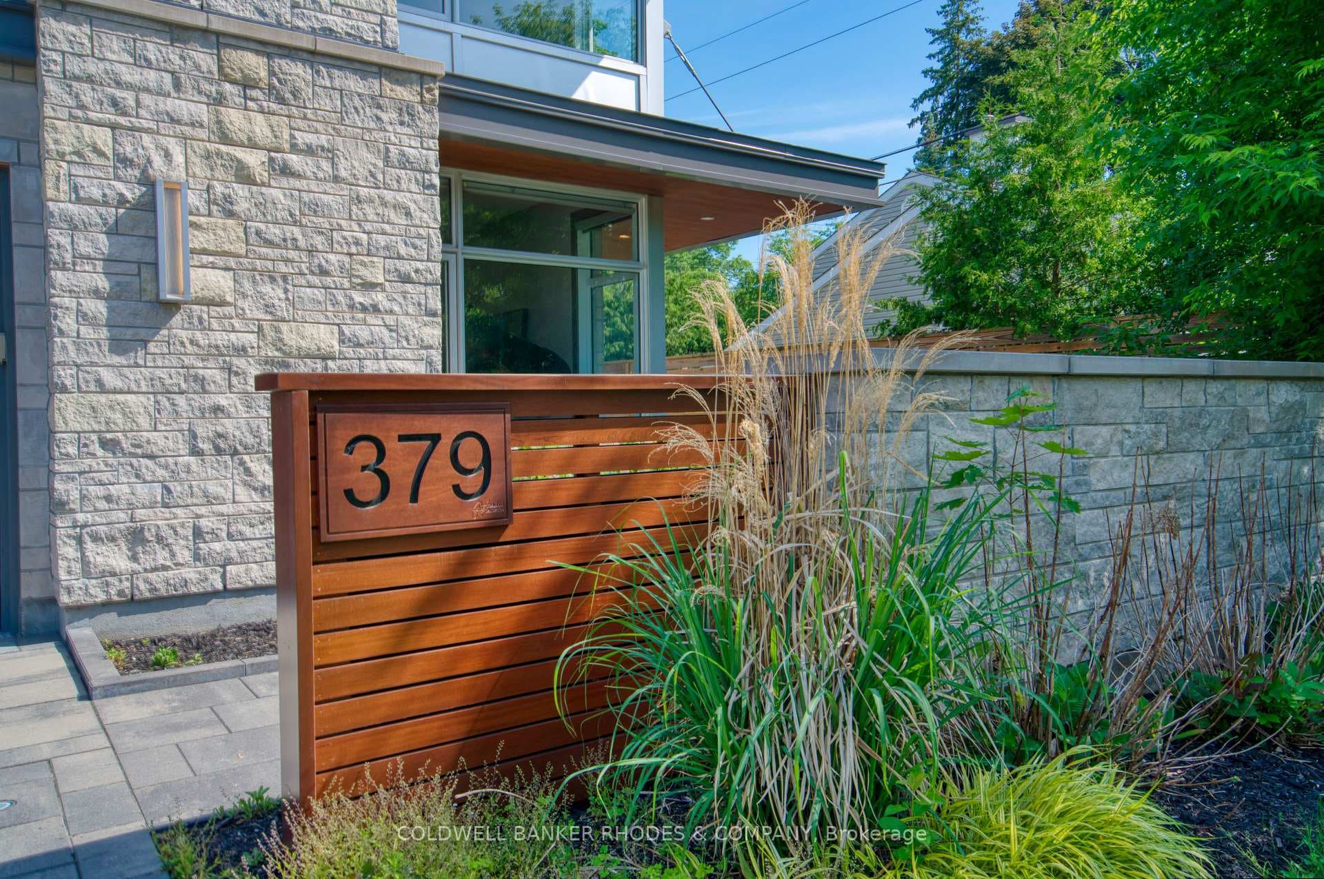 Stunning mahogoney wood house number