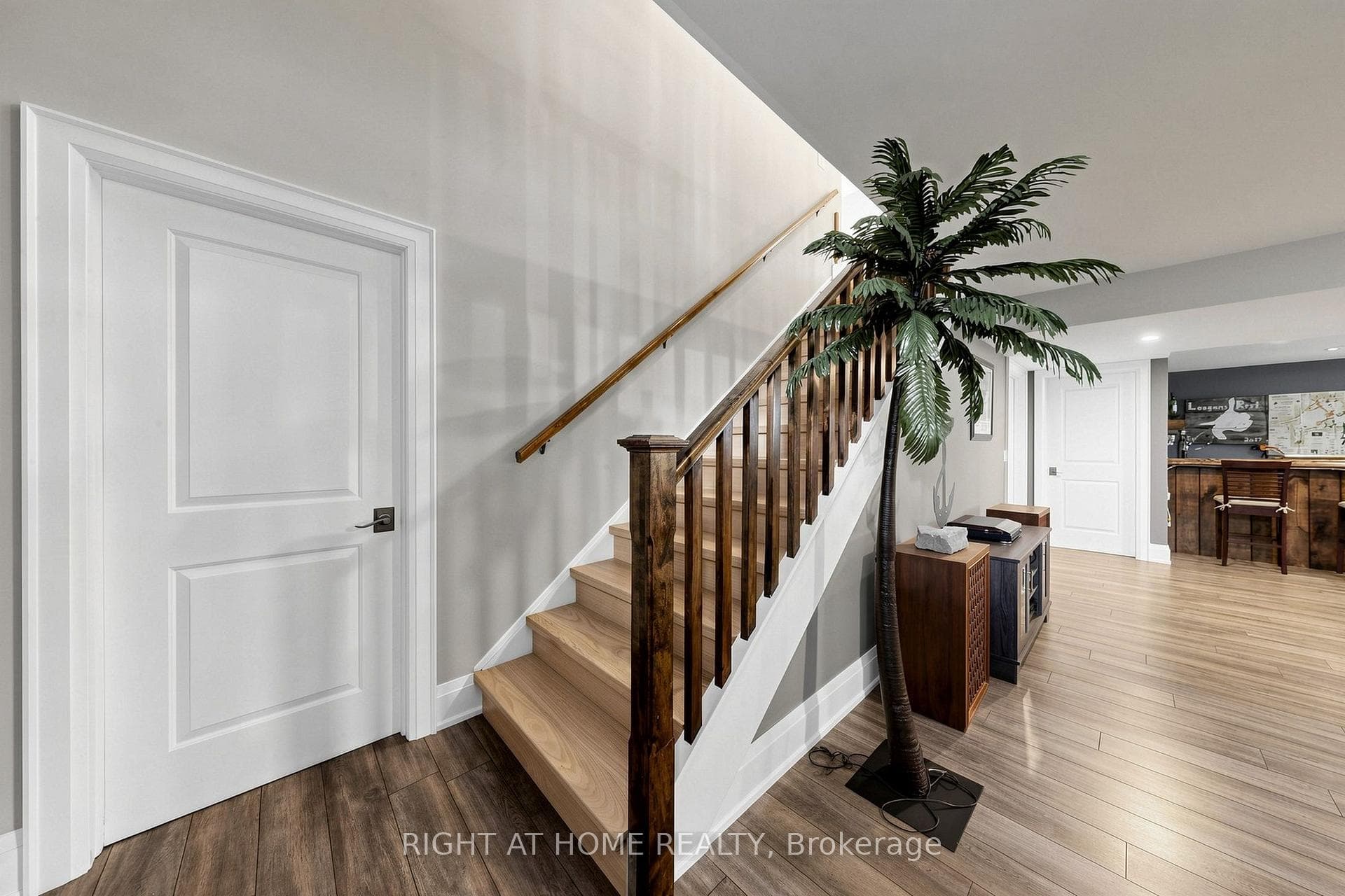 OAK STAIRCASE DECENDING TO LOWER FLOOR