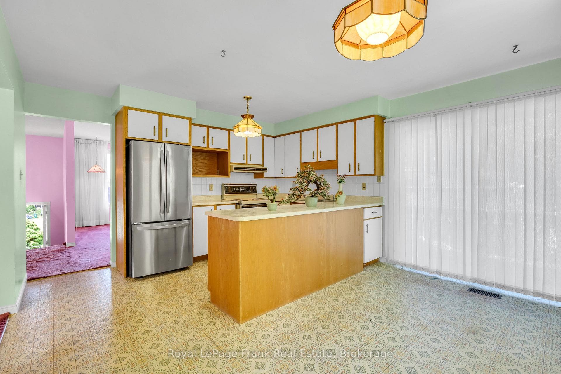 Kitchen with walkout to large deck