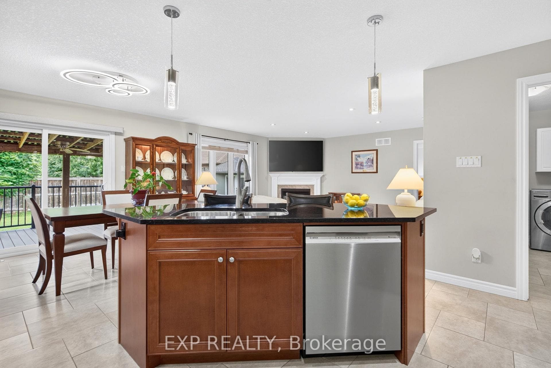 Granite island with dishwasher.