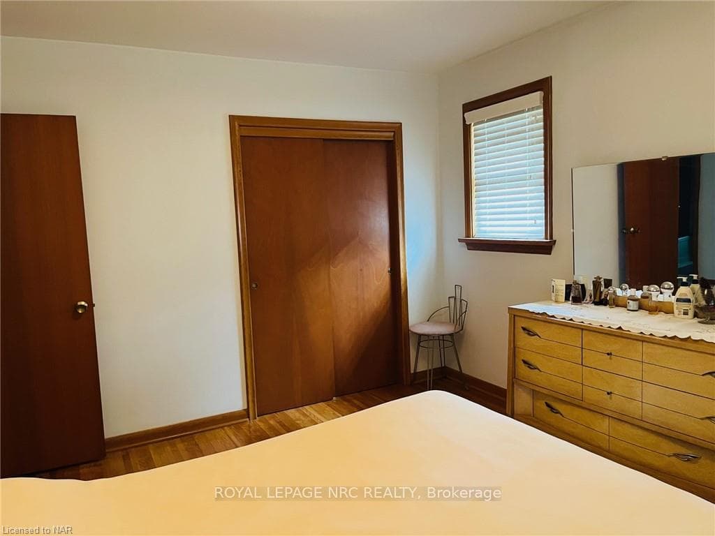 Other side of the primary bedroom shows the closet