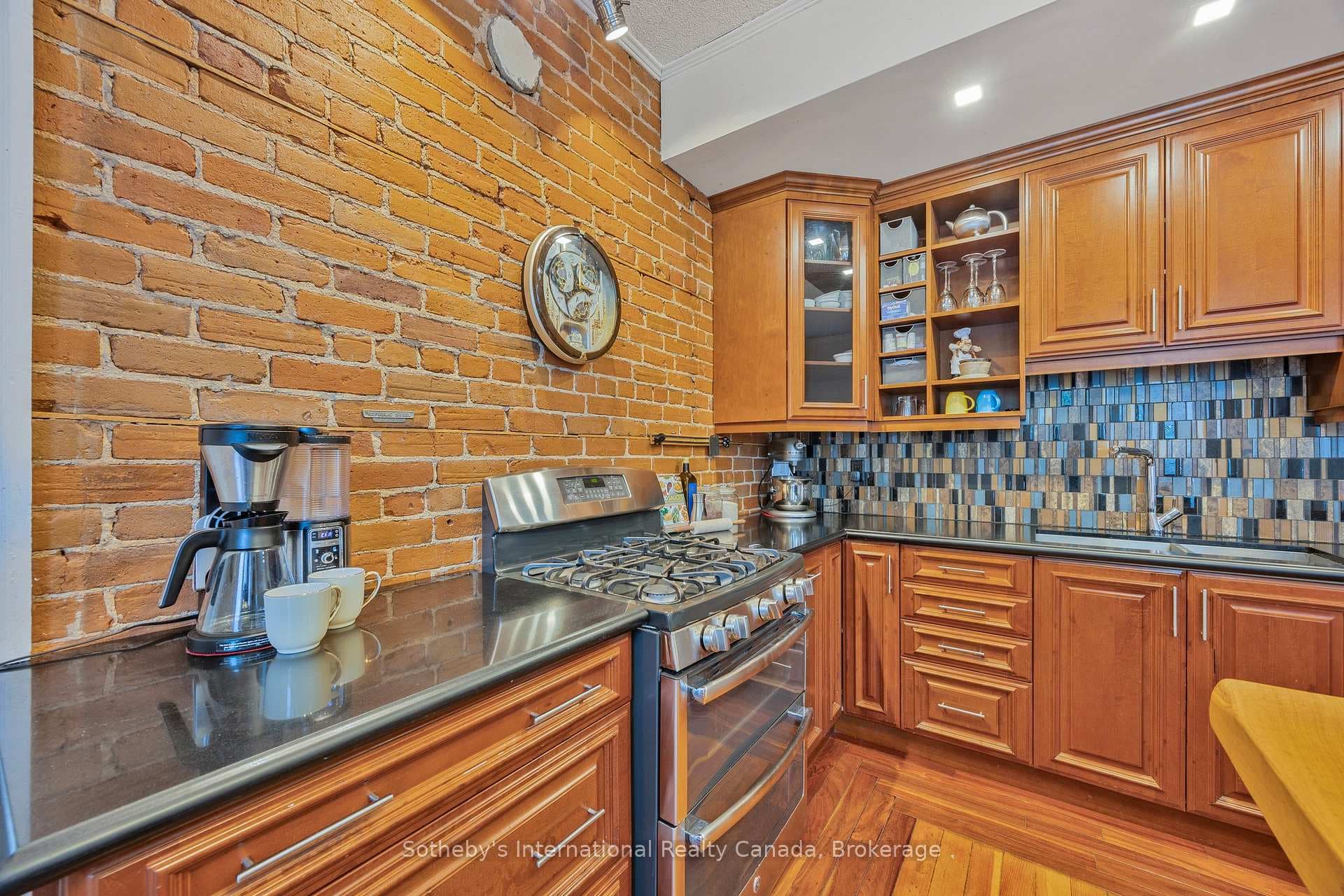 Exposed brick, gas stove