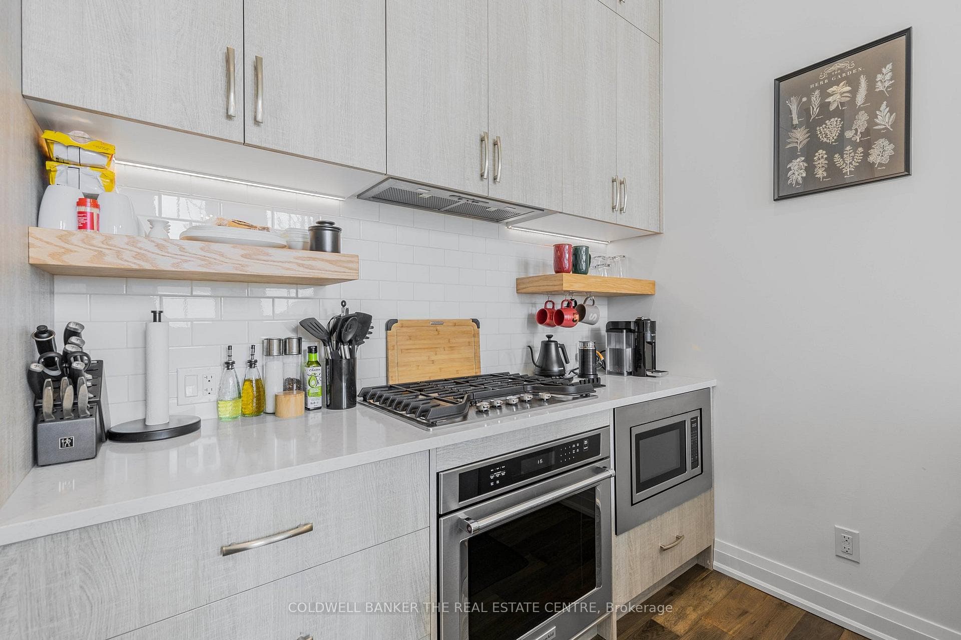Kitchen with quartz counters & premium appliances