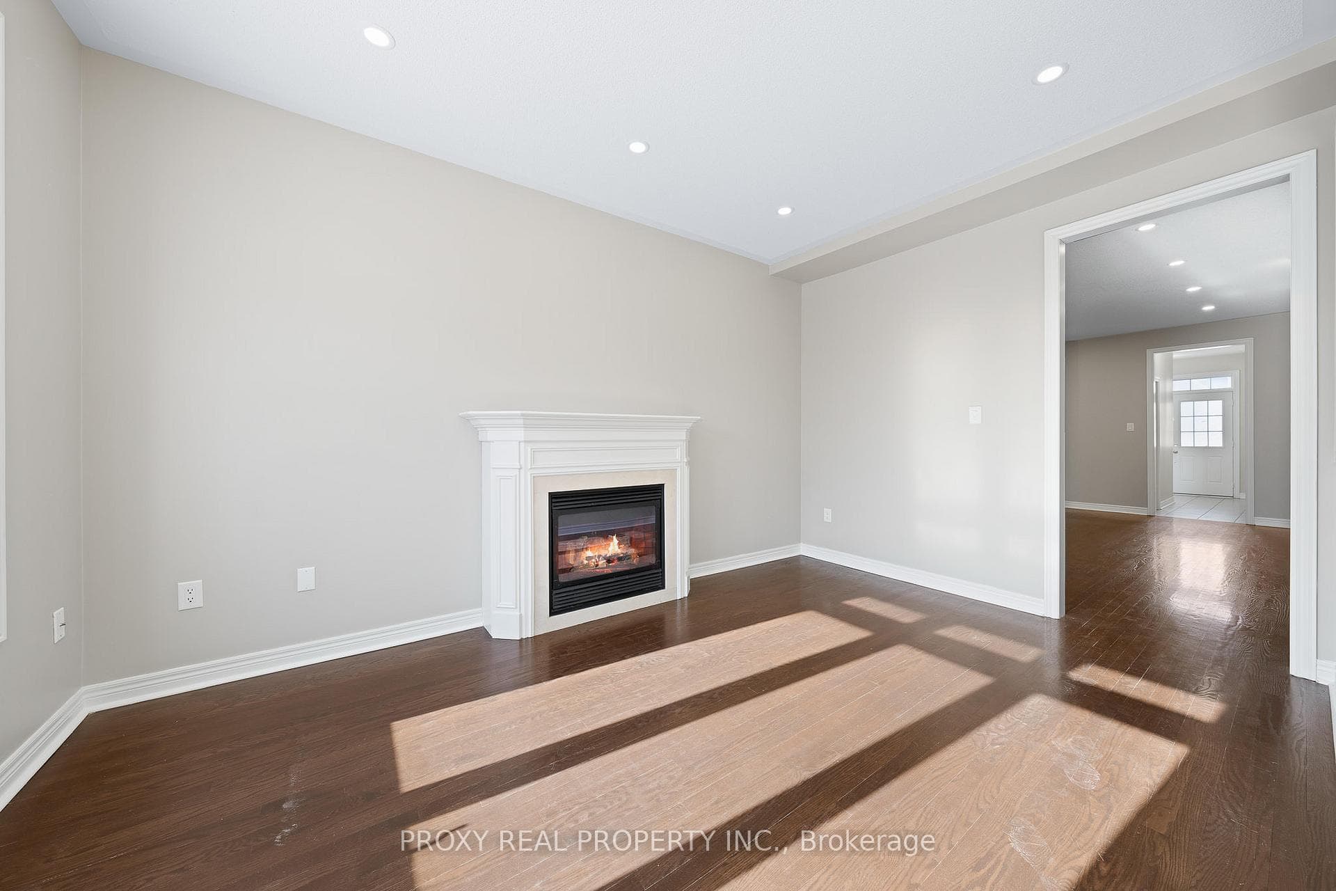 Sun Filled Family Room With Chic & Cozy Fireplace