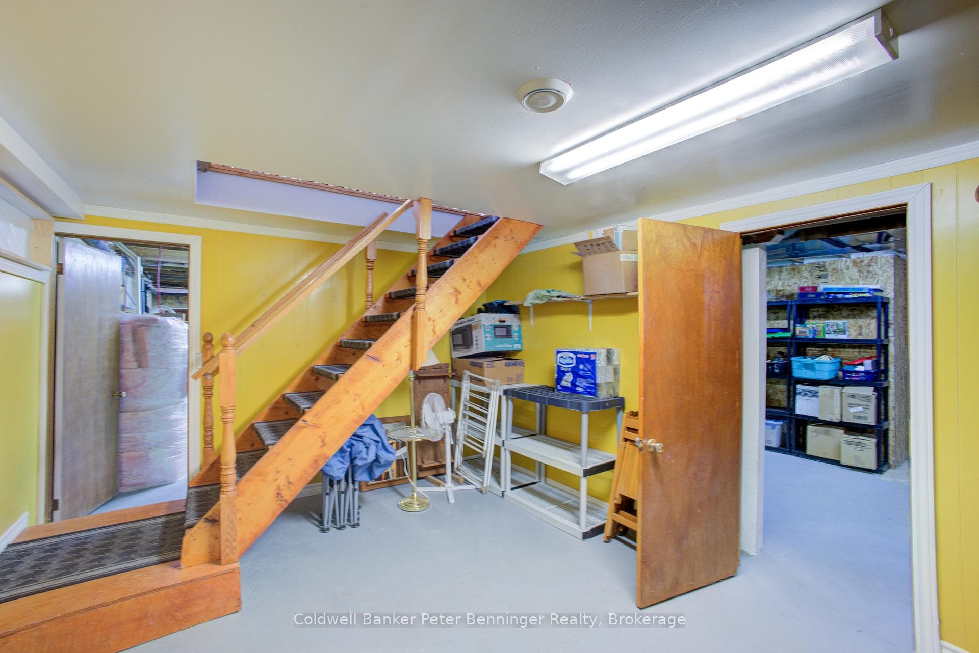 Basement stairs in 5th of five basement rooms.