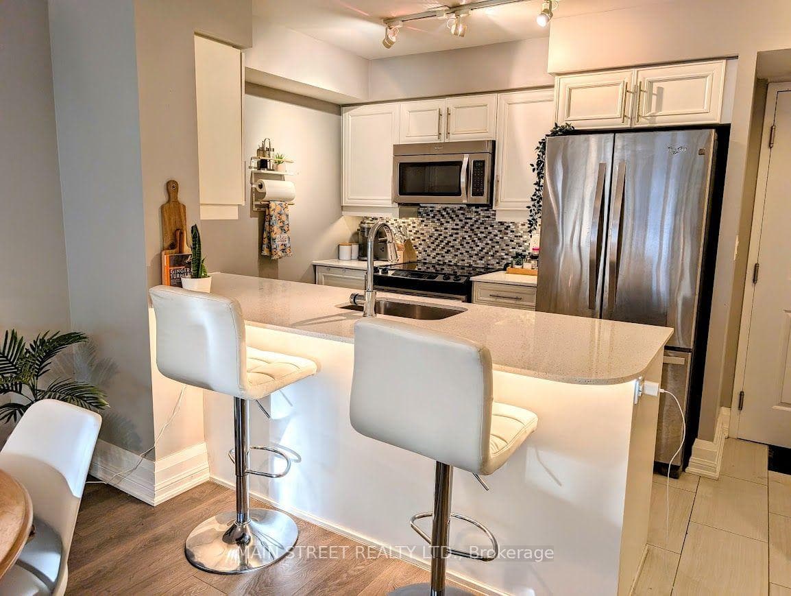 open concept kitchen with breakfast bar