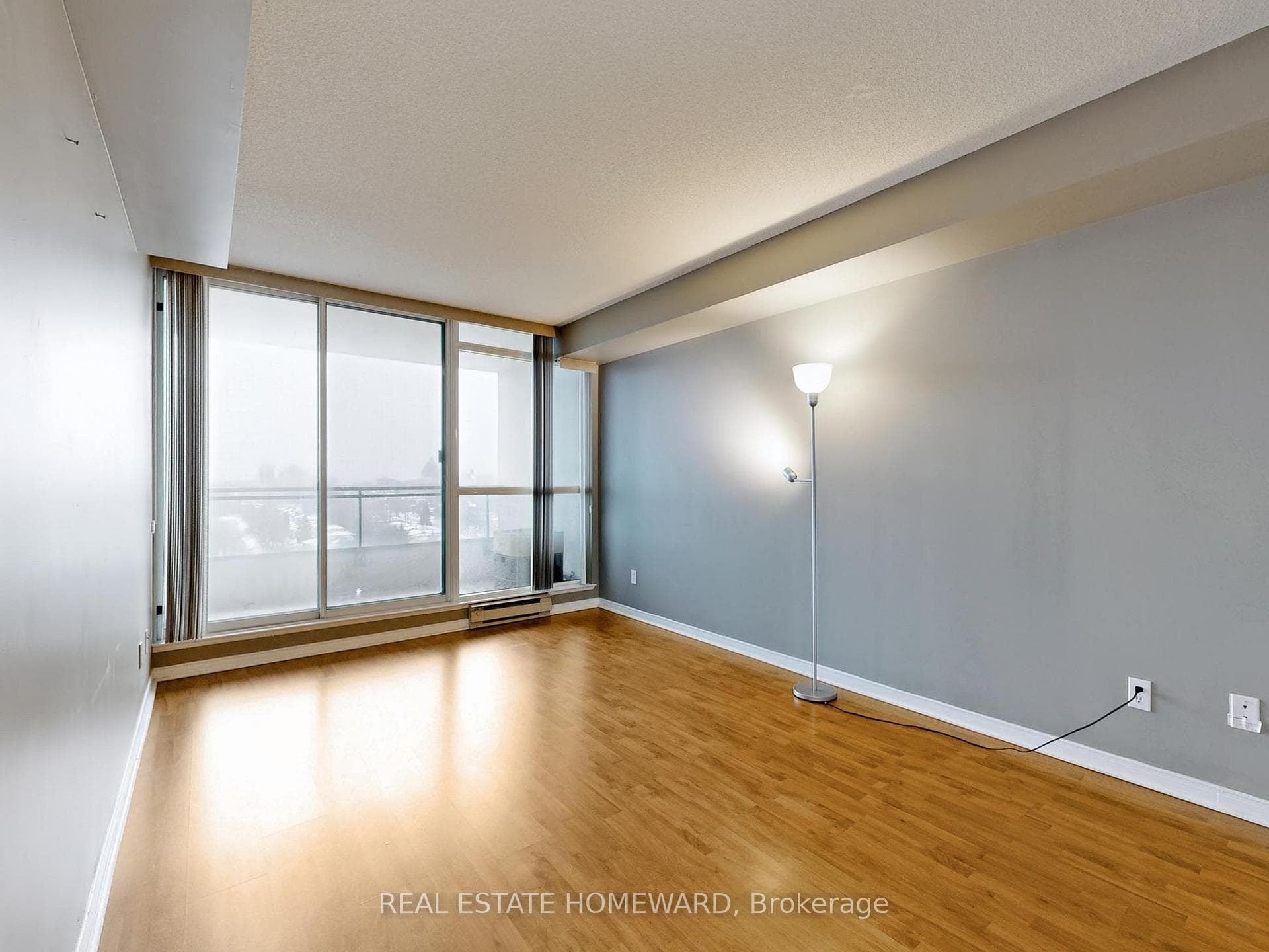 Primary Bedroom with Walk-out to Balcony