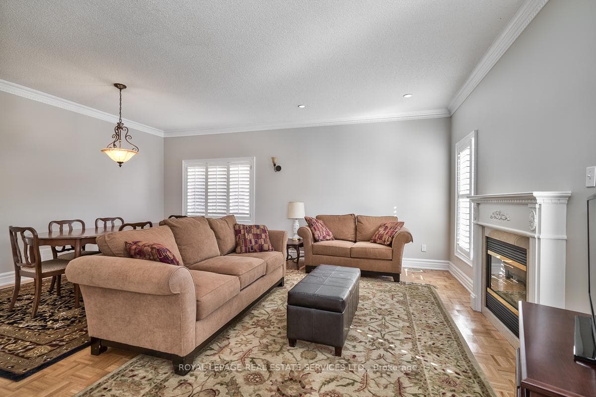 Living/Dining Area Highlighted by a Gas Fireplace
