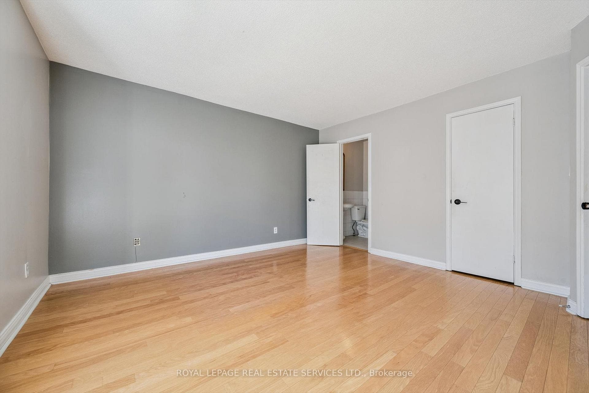 Spacious Primary Bedroom Offering a Walk-In Closet