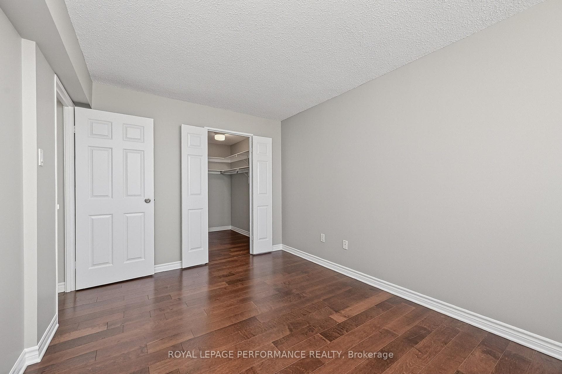 Primary bedroom with walk-in closet and ensuite