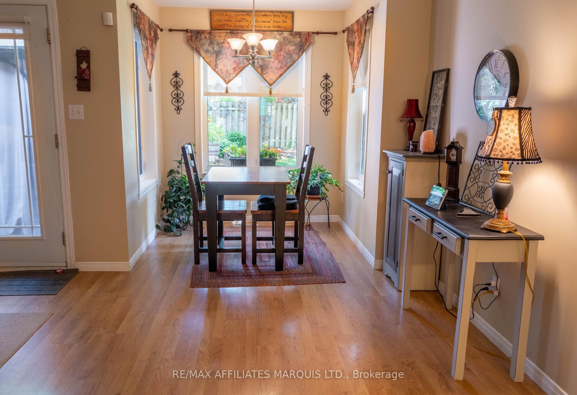 Dining nook overlooking backyard oasis
