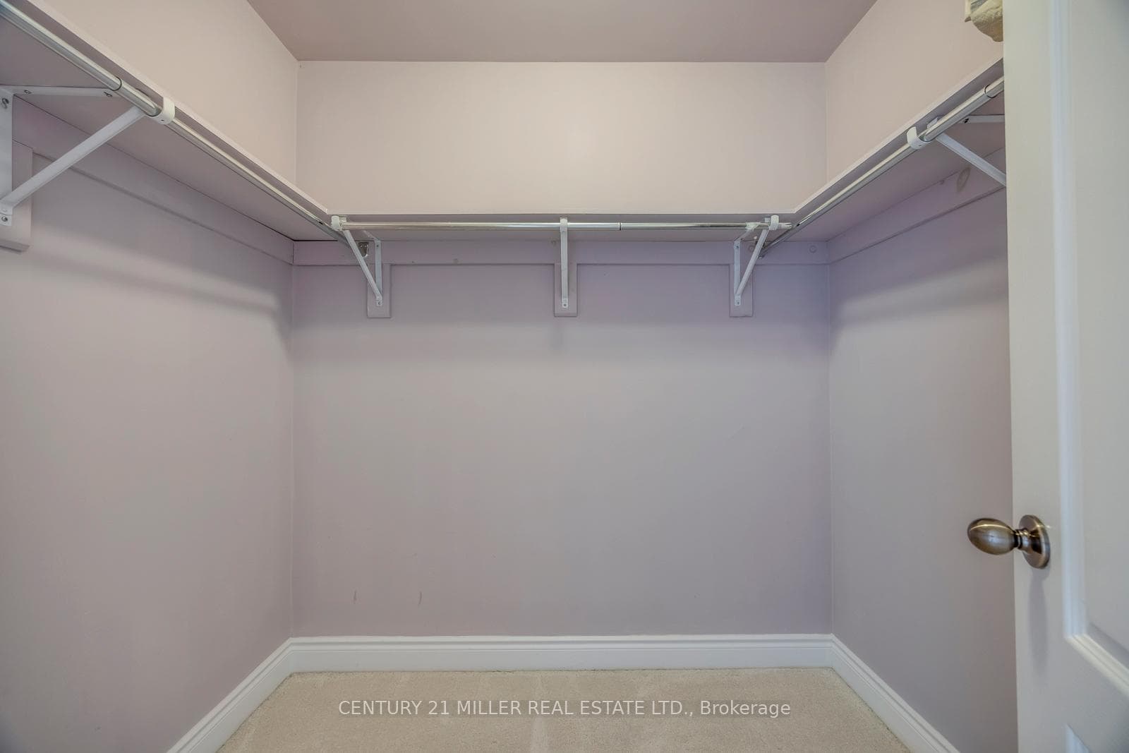 Walk-In Closet With Built-In Shelving