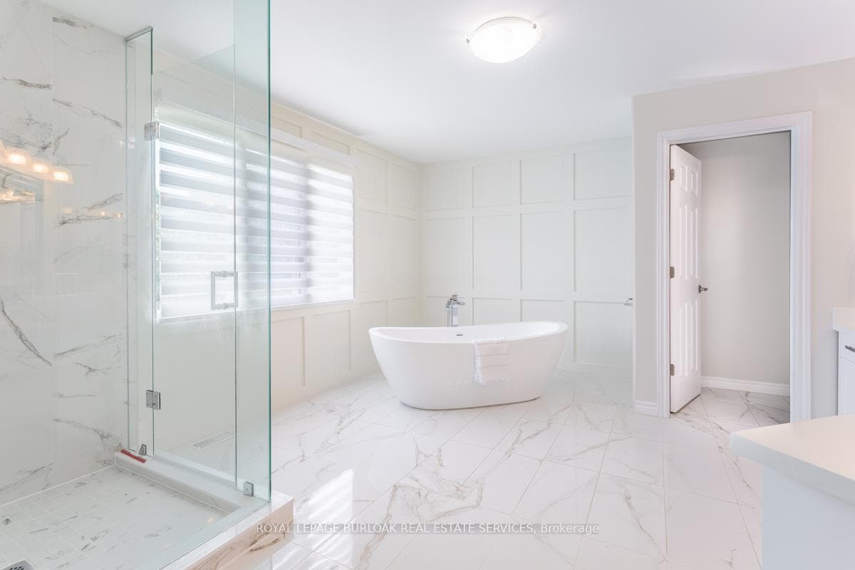 Gorgeous corner tub and separate water closet.