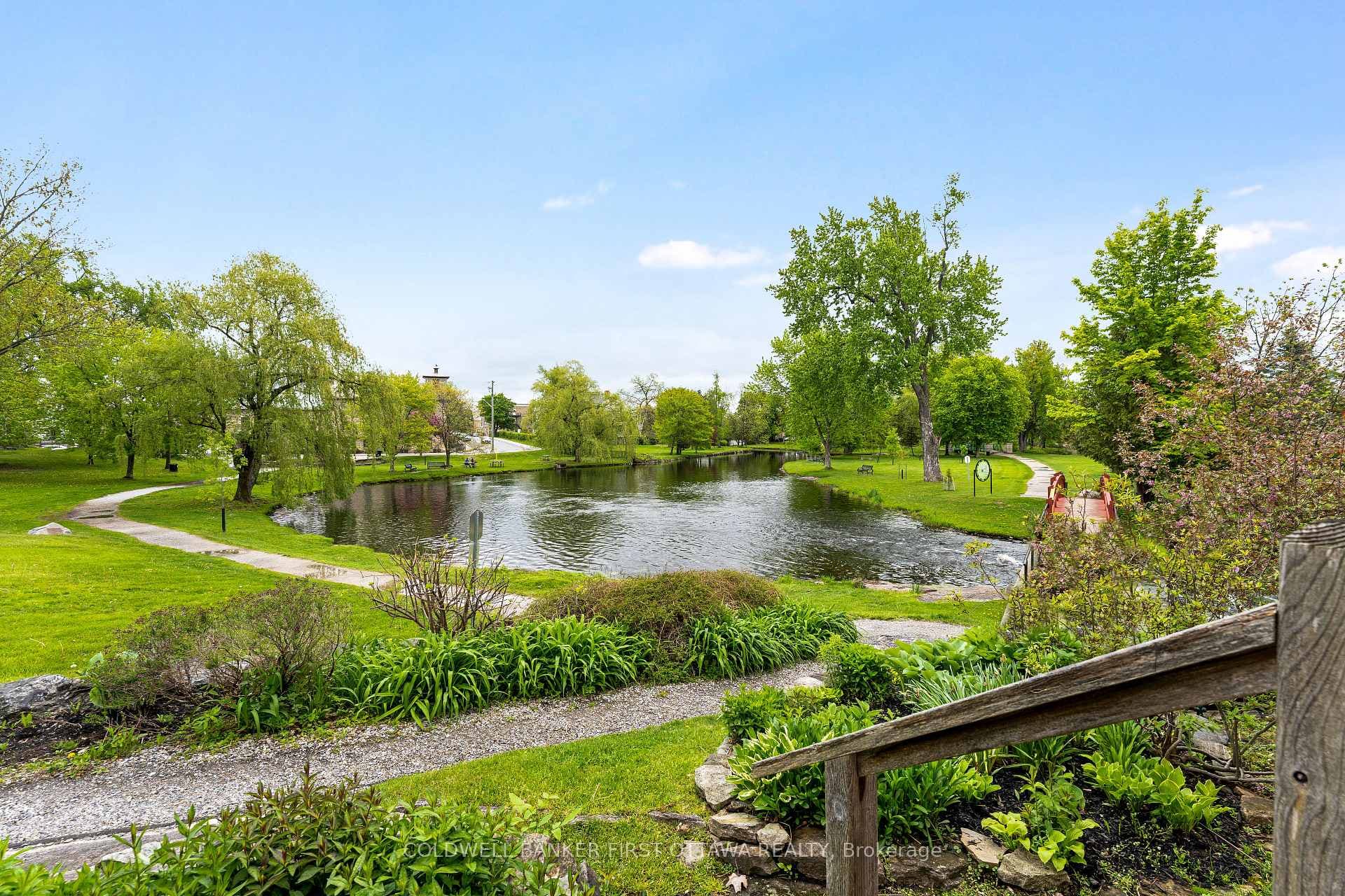 Walk over bridge to Stewart Park & its trails