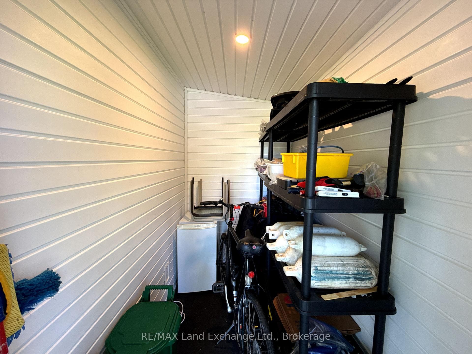 Storage Room with Shelving and Mini fridge