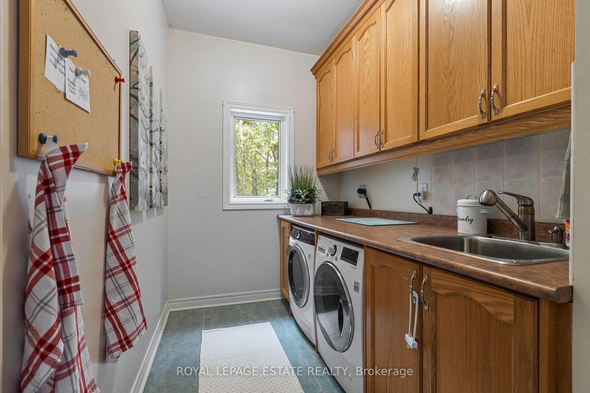 Enter from the garage to spacious laundry room