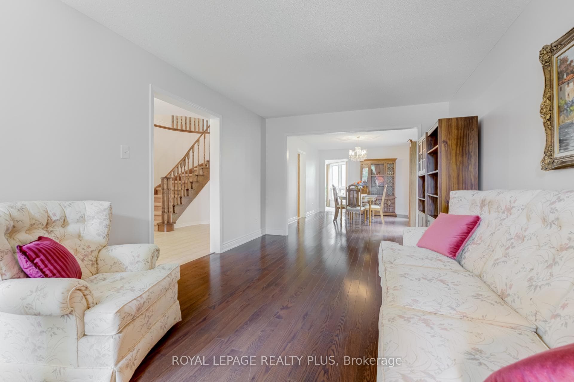 Large open concept living room; hardwood floors