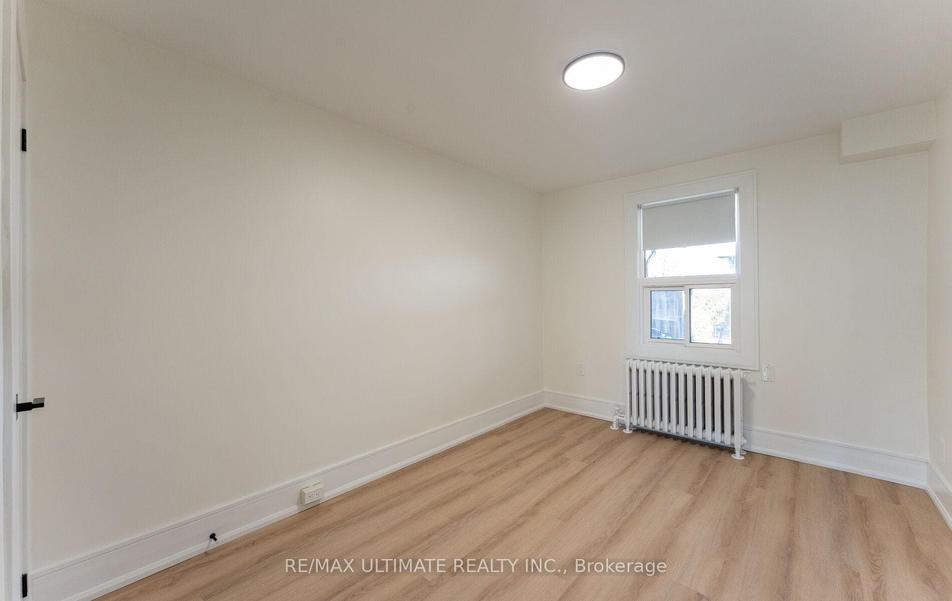 Bedroom 1 of 2 w/ Roller Shade