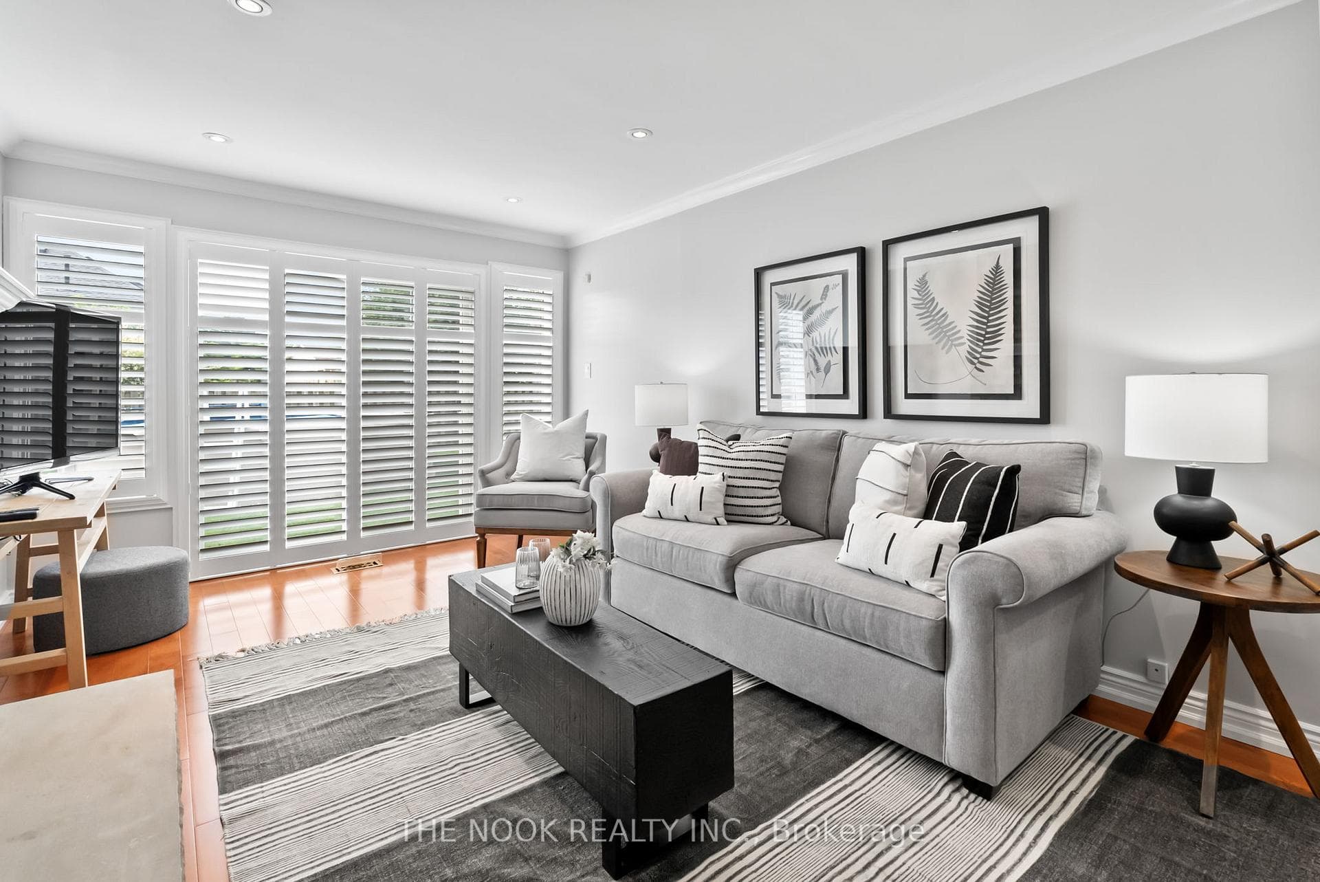 Patio door walkout to the backyard w/shutters