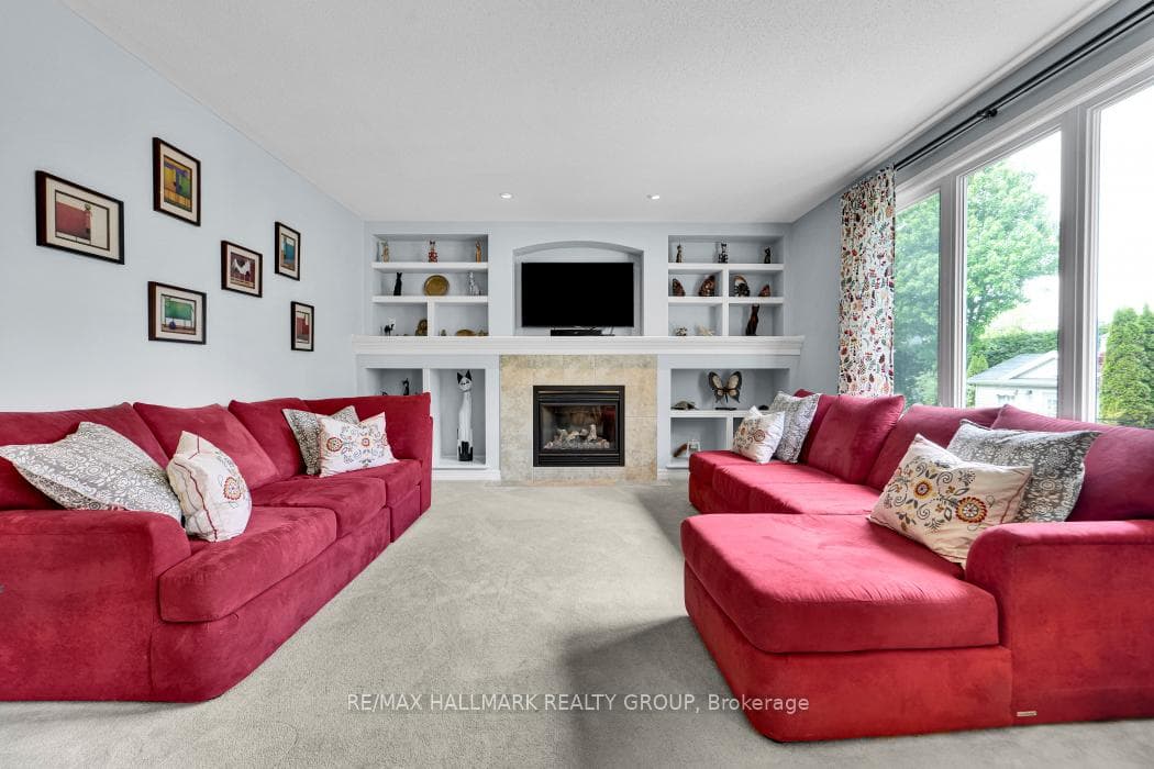 Large windows overlooking the park-like backyard.
