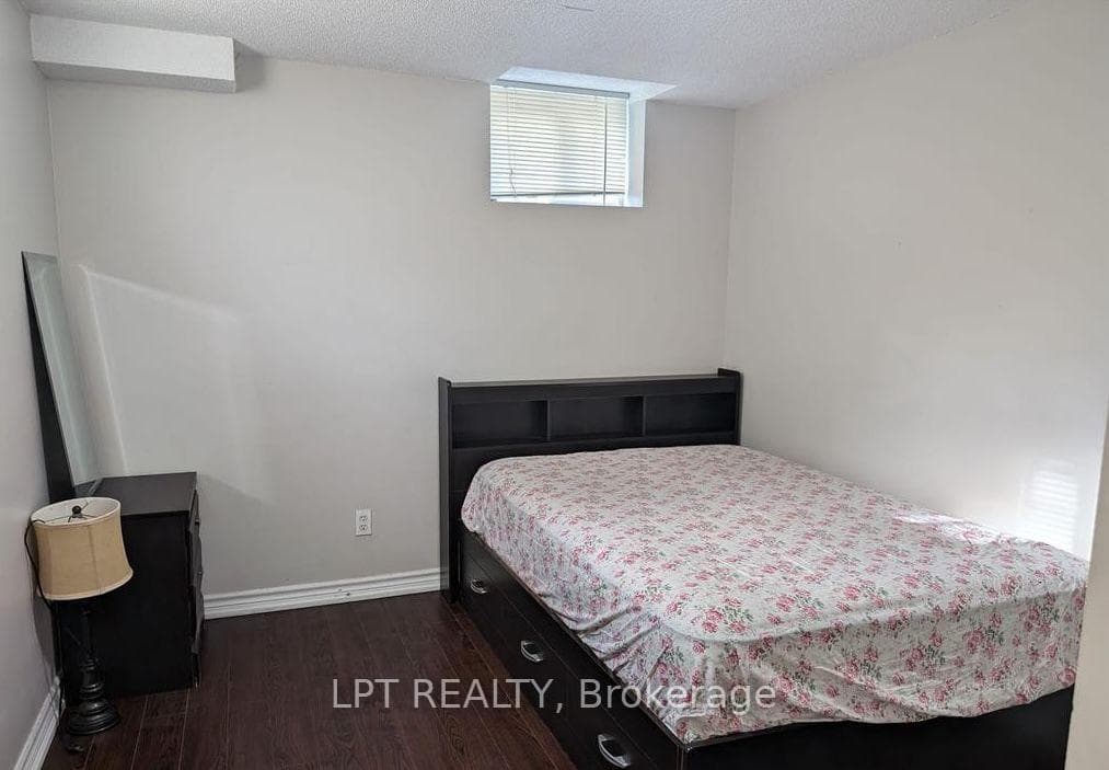 1ST BEDROOM W/ CLOSET AND WINDOW