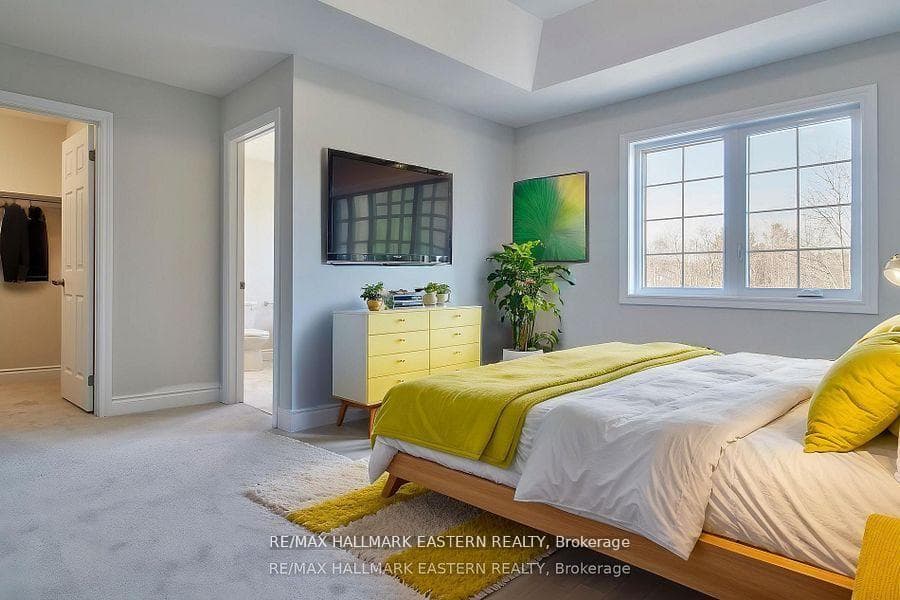 Primary bedroom, walk-in closet and ensuite bath
