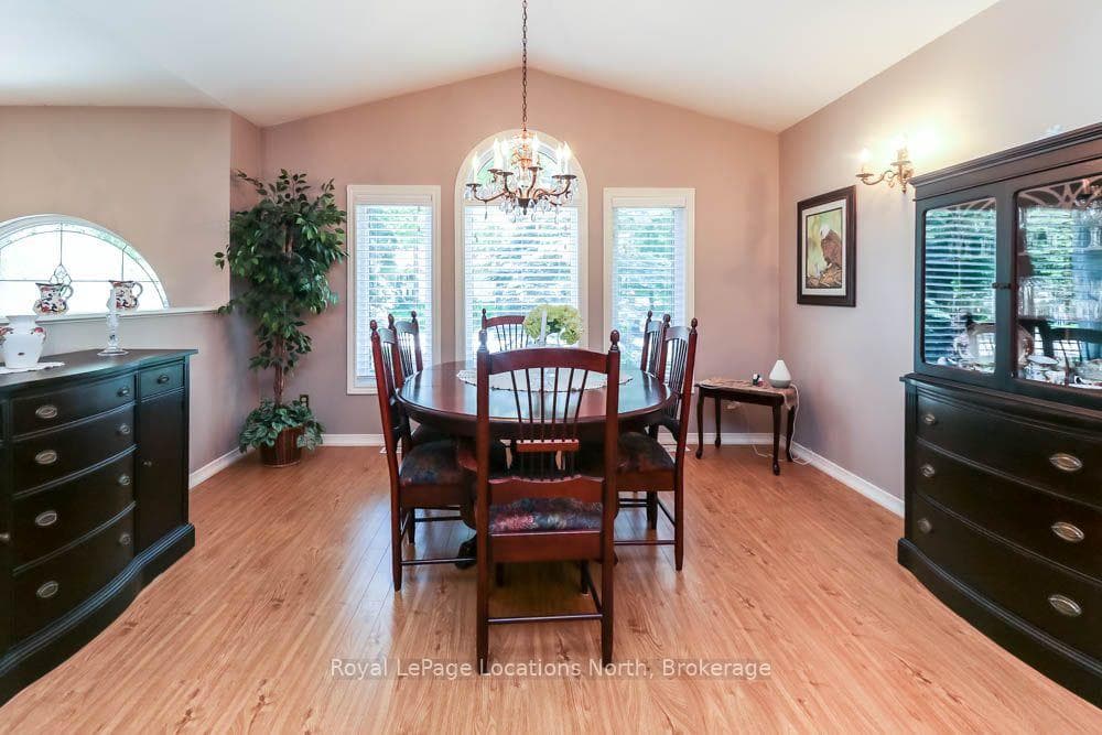 Bright Formal Dining Area (with Vaulted Ceilings)